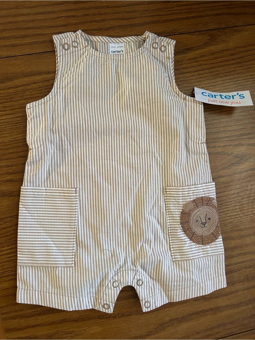 Carter's Cream and Tan Striped Baby Romper with Lion Pocket